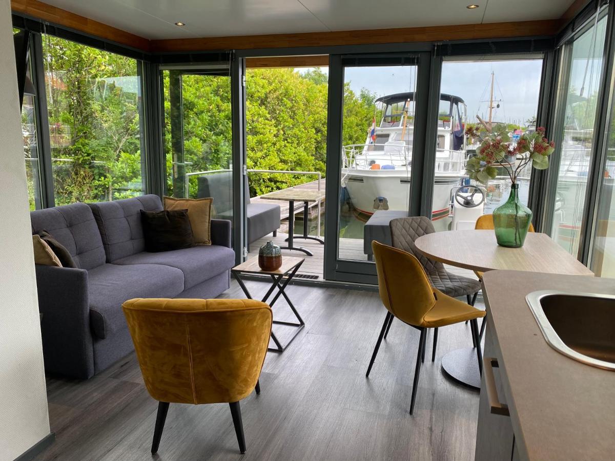 Отель Houseboat De Amstel Монникендам Экстерьер фото